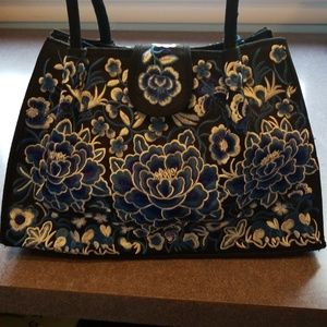 Black canvas purse with blue lotus flowers